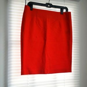 Bright orange/red skirt